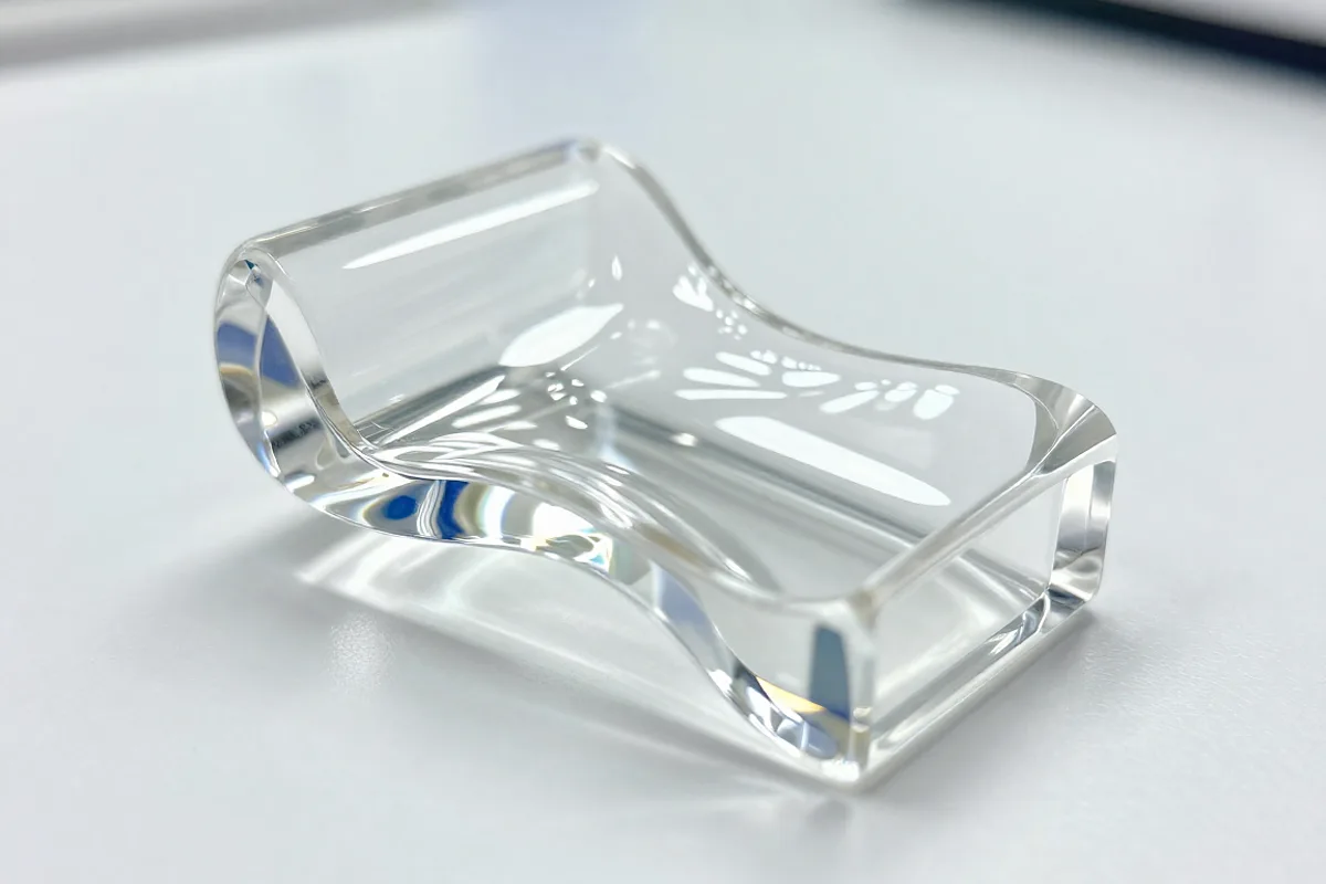Mirror polished metal surface with optical-grade reflective finish