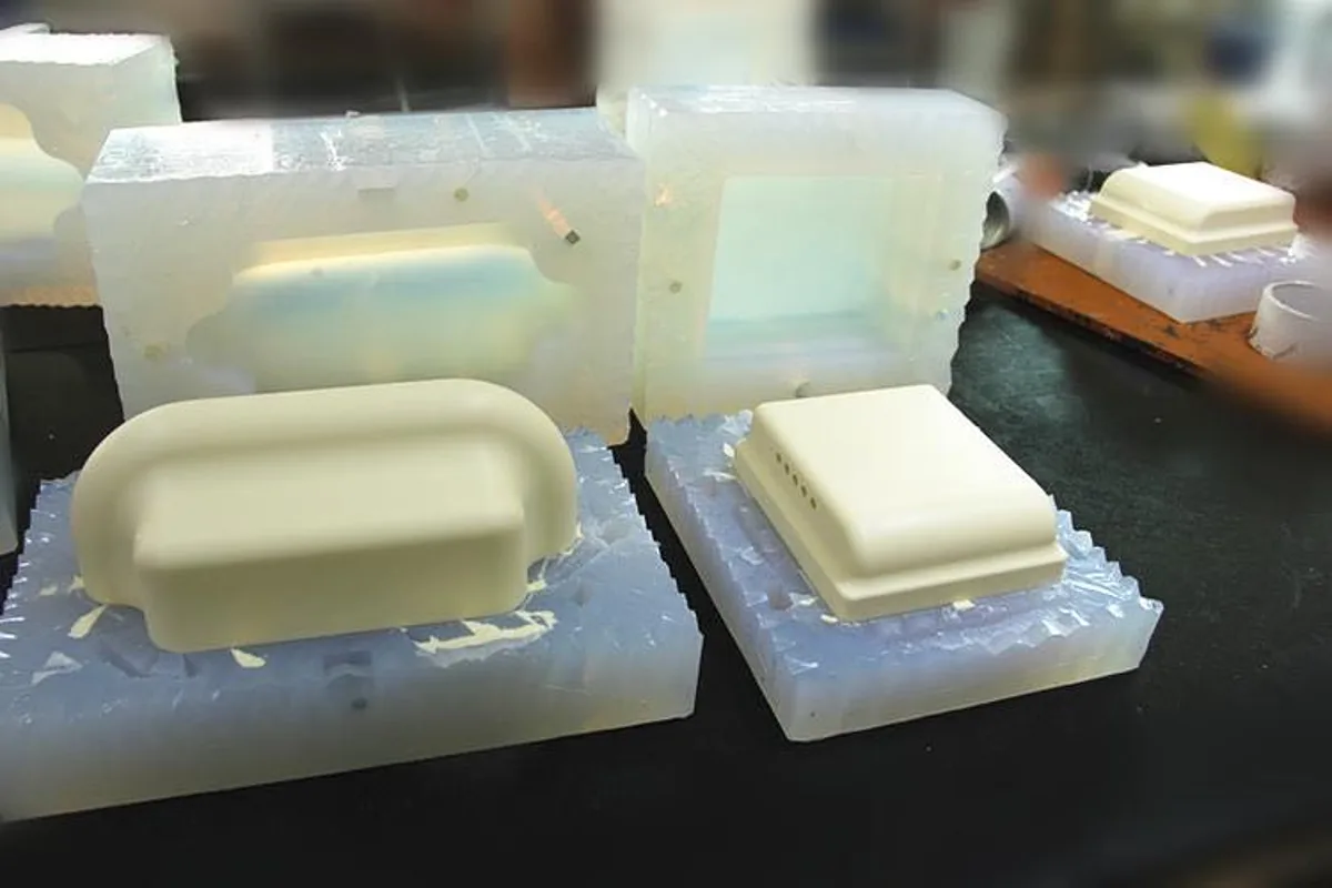 Multi-material overmolding process for soft elastomer bonding
